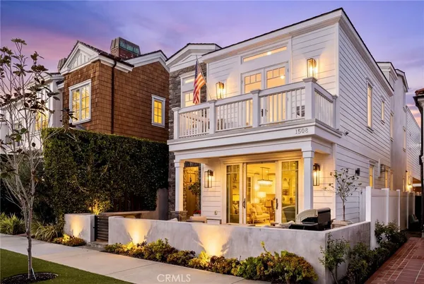 a front view of a house with a outdoor space