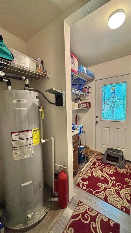 680 Choctaw Quitman, TX 75783 - Photo 14 of 33 a bedroom with a bed and wooden floor