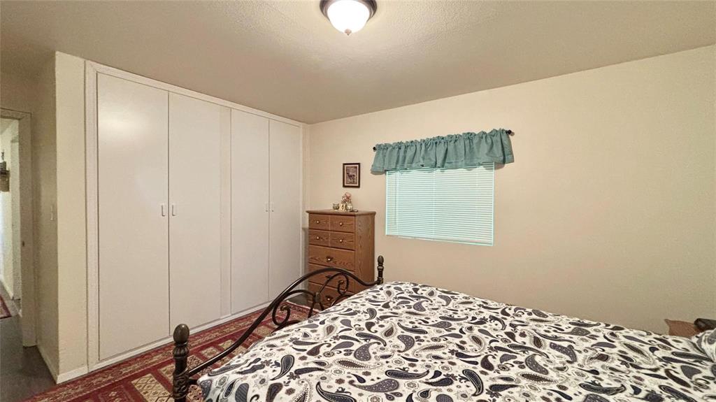 680 Choctaw Quitman, TX 75783 - Photo 17 of 33 a bedroom with a bed and a window