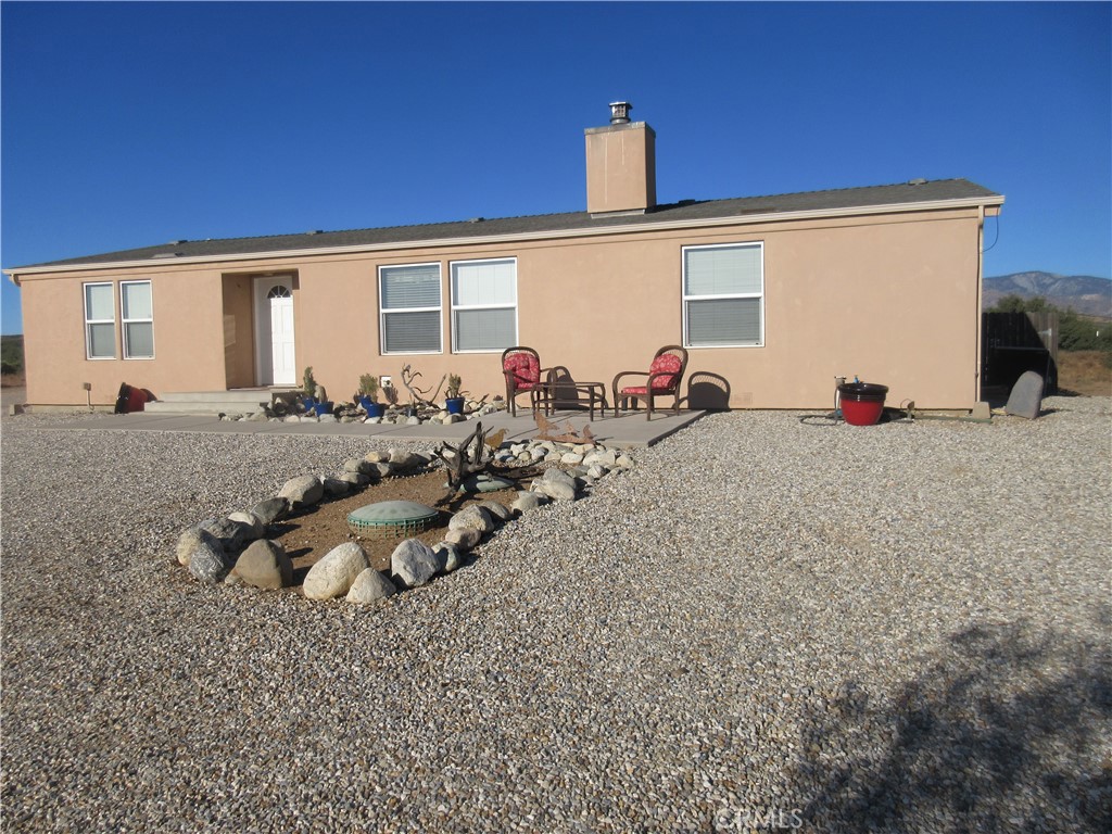 Undisclosed Address Phelan, CA 92371 - Photo 3 of 42 a backyard of a house with seating space