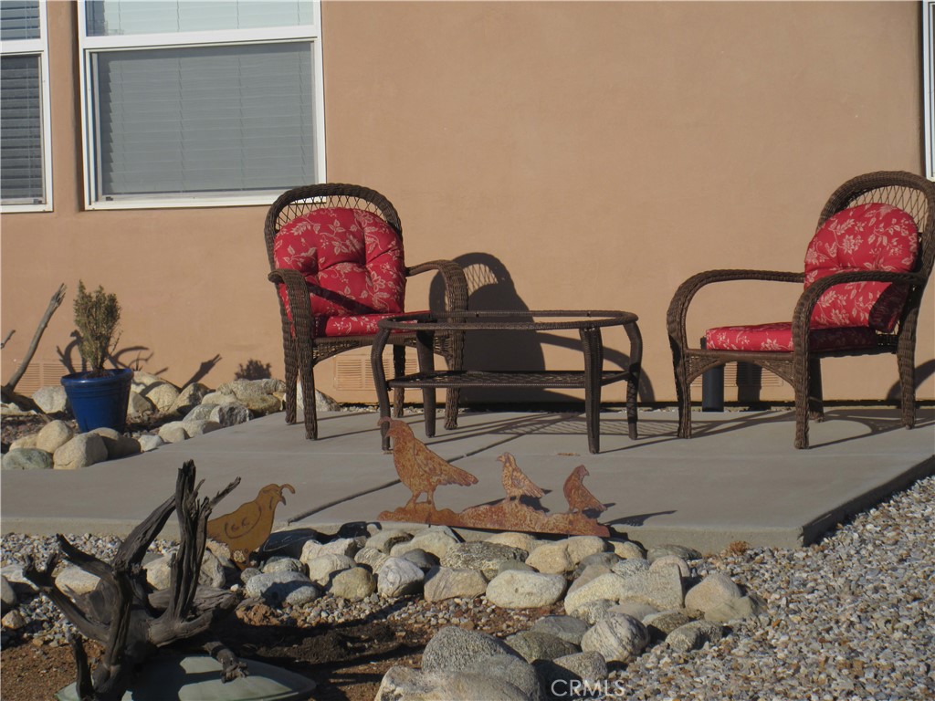 Undisclosed Address Phelan, CA 92371 - Photo 4 of 42 a room with furniture and mirror