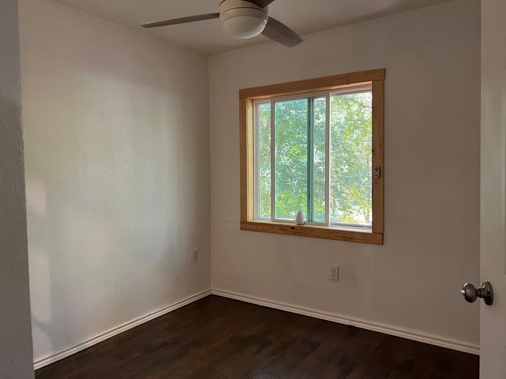 124 Griffith Bend Road Mabank, TX 75156 - Photo 12 of 15 an empty room with a window