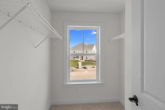 a view of an entryway with a window