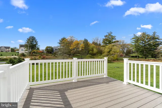 a view of a wooden roof deck