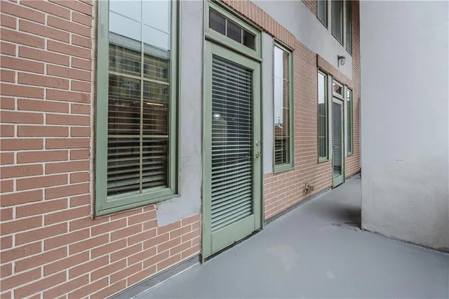 a front view of a building with glass windows