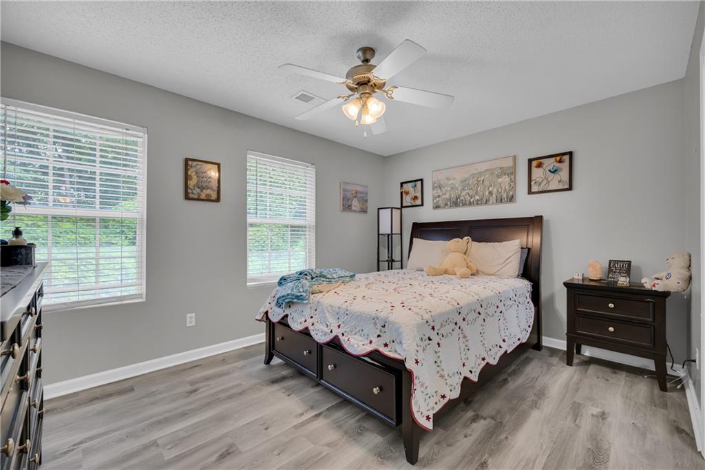 1498 Box Circle Winder, GA 30680 - Photo 33 of 56 a bedroom with a bed and a window