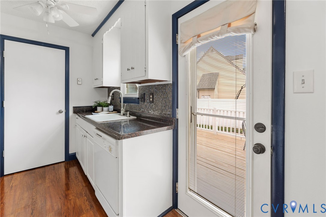 15908 Tri Gate Road Chester, VA 23831 - Photo 13 of 28 a bathroom with a granite countertop sink and a mirror