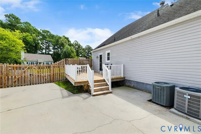 a view of outdoor space with deck and furniture