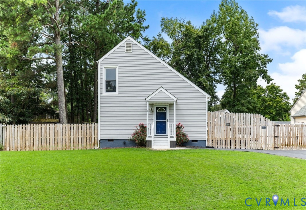 15908 Tri Gate Road Chester, VA 23831 - Photo 28 of 28 a front view of a house with garden
