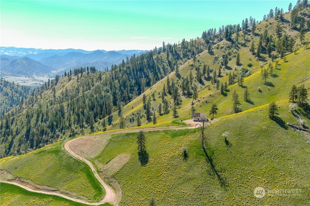 6734 Nahahum Canyon Road Cashmere, WA 98815 - Photo 8 of 32 a view of a pool