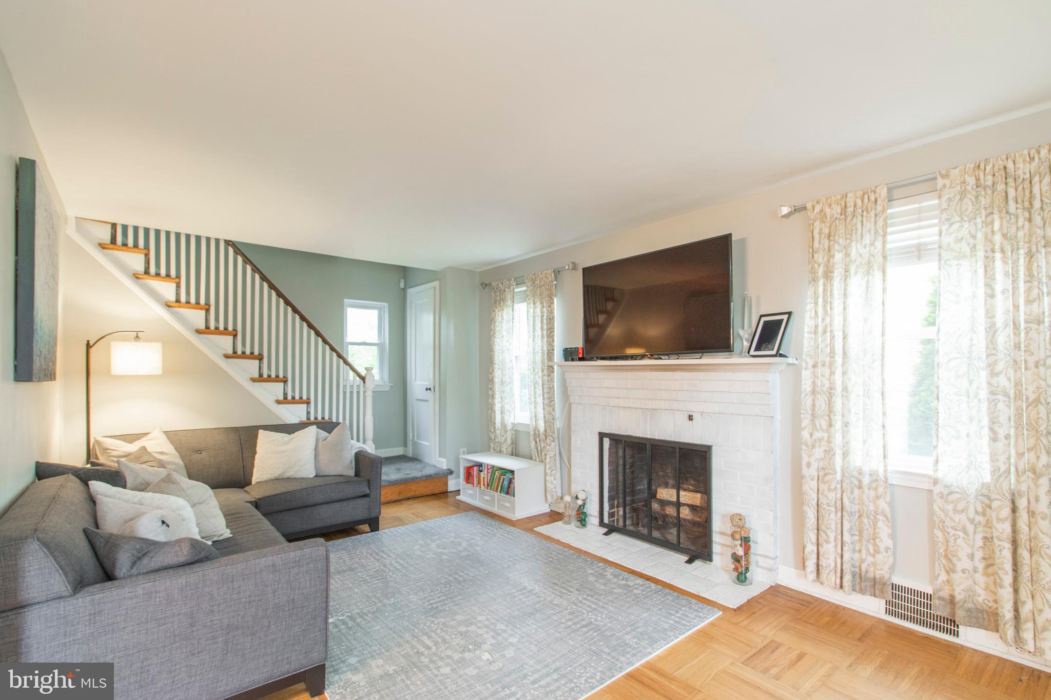 603 Paper Mill Road Oreland, PA 19075 - Photo 6 of 23 Living room with fireplace