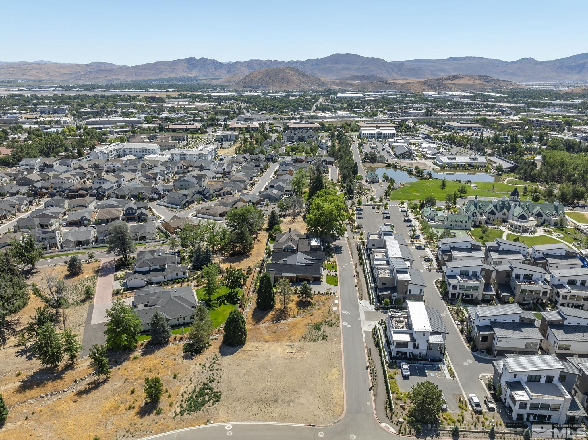 629 Silver Charm Way, Unit 7 Reno, NV 89511 - Photo 12 of 35 an aerial view of residential houses and outdoor space