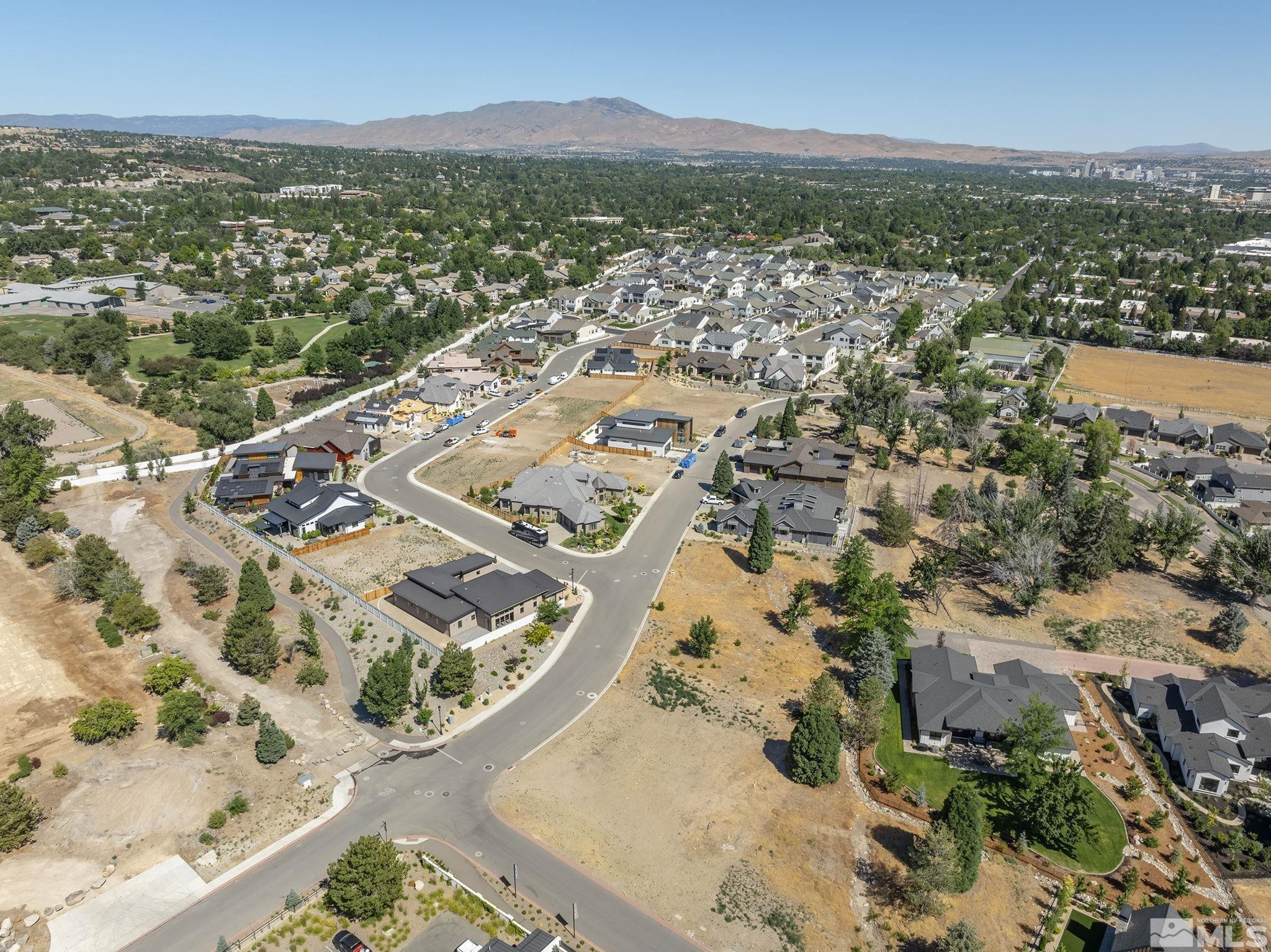 629 Silver Charm Way, Unit 7 Reno, NV 89511 - Photo 14 of 35 an aerial view of residential houses with outdoor space
