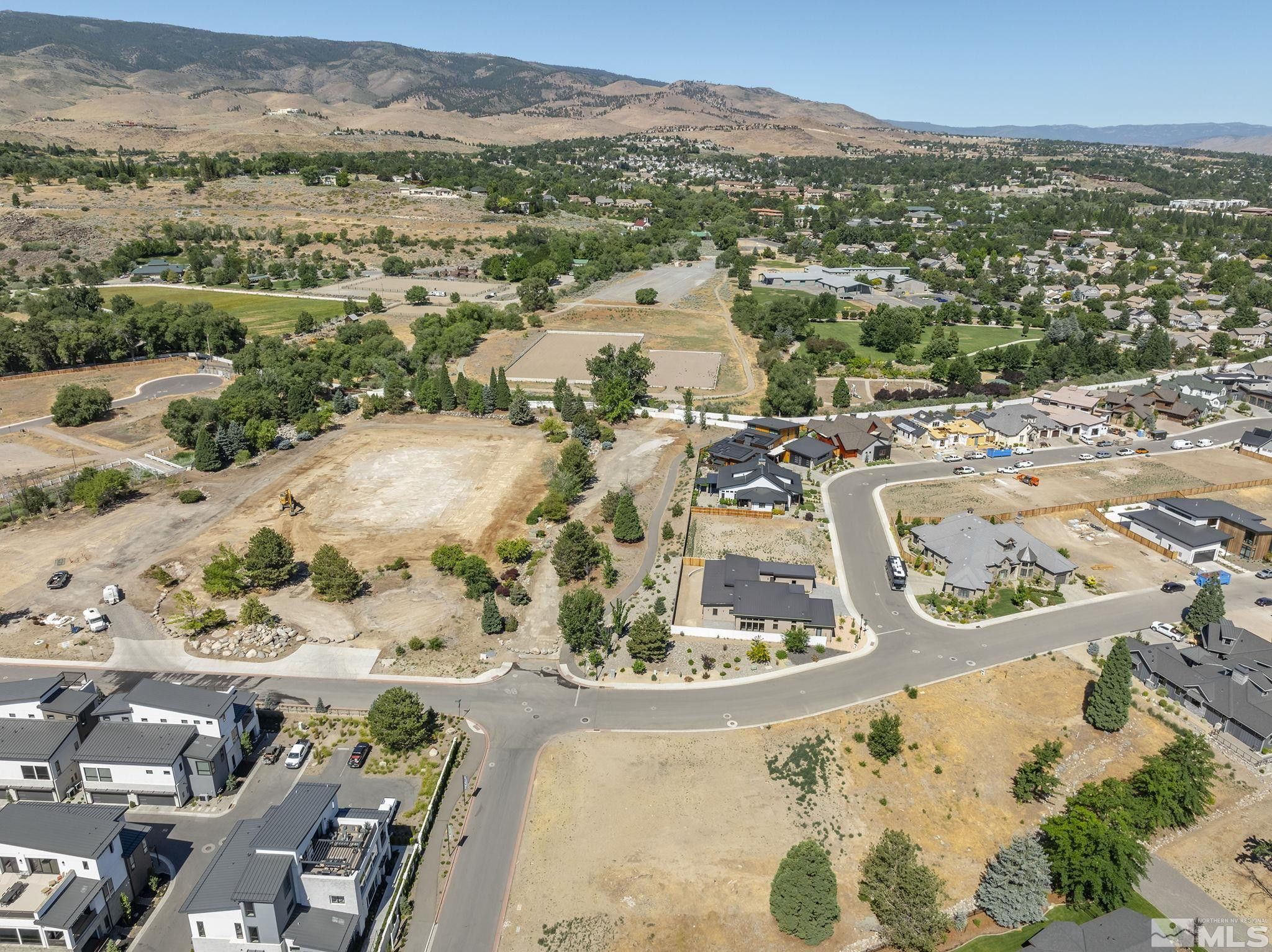 629 Silver Charm Way, Unit 7 Reno, NV 89511 - Photo 15 of 35 an aerial view of a house with a mountain