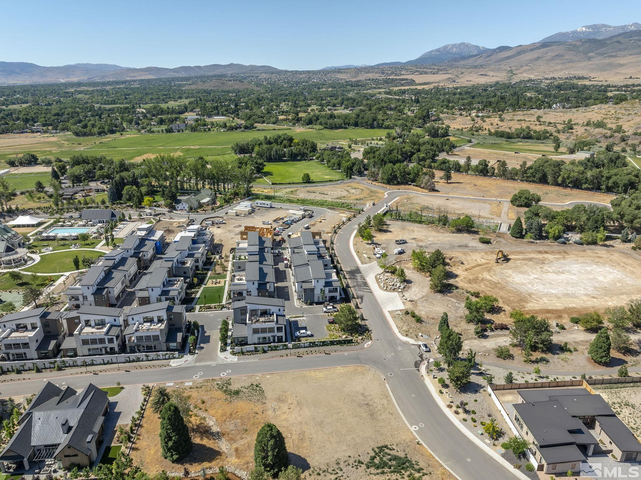 629 Silver Charm Way, Unit 7 Reno, NV 89511 - Photo 17 of 35 an aerial view of a city with mountains