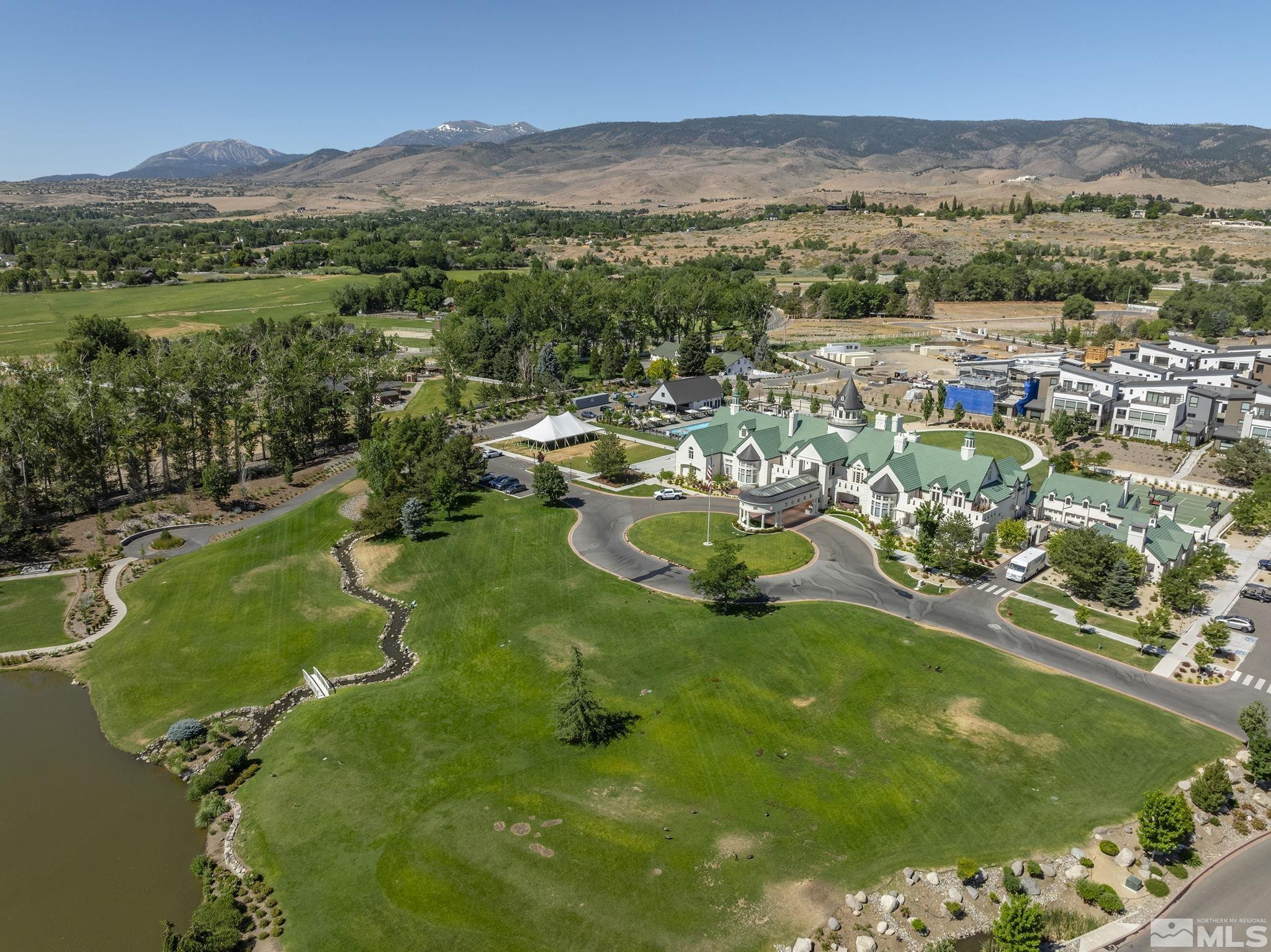 629 Silver Charm Way, Unit 7 Reno, NV 89511 - Photo 26 of 35 a view of a lake with a mountain