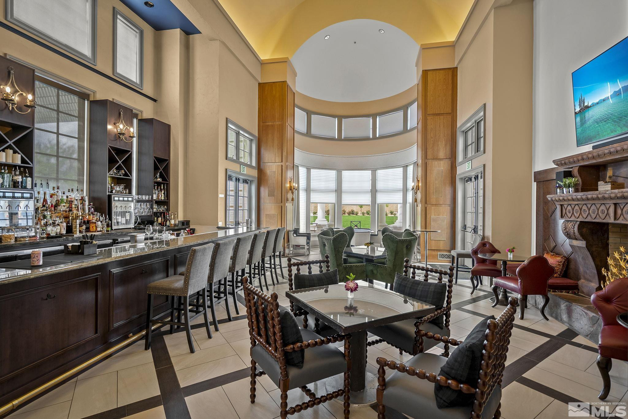 629 Silver Charm Way, Unit 7 Reno, NV 89511 - Photo 28 of 35 a view of a dining room with furniture window and wooden floor