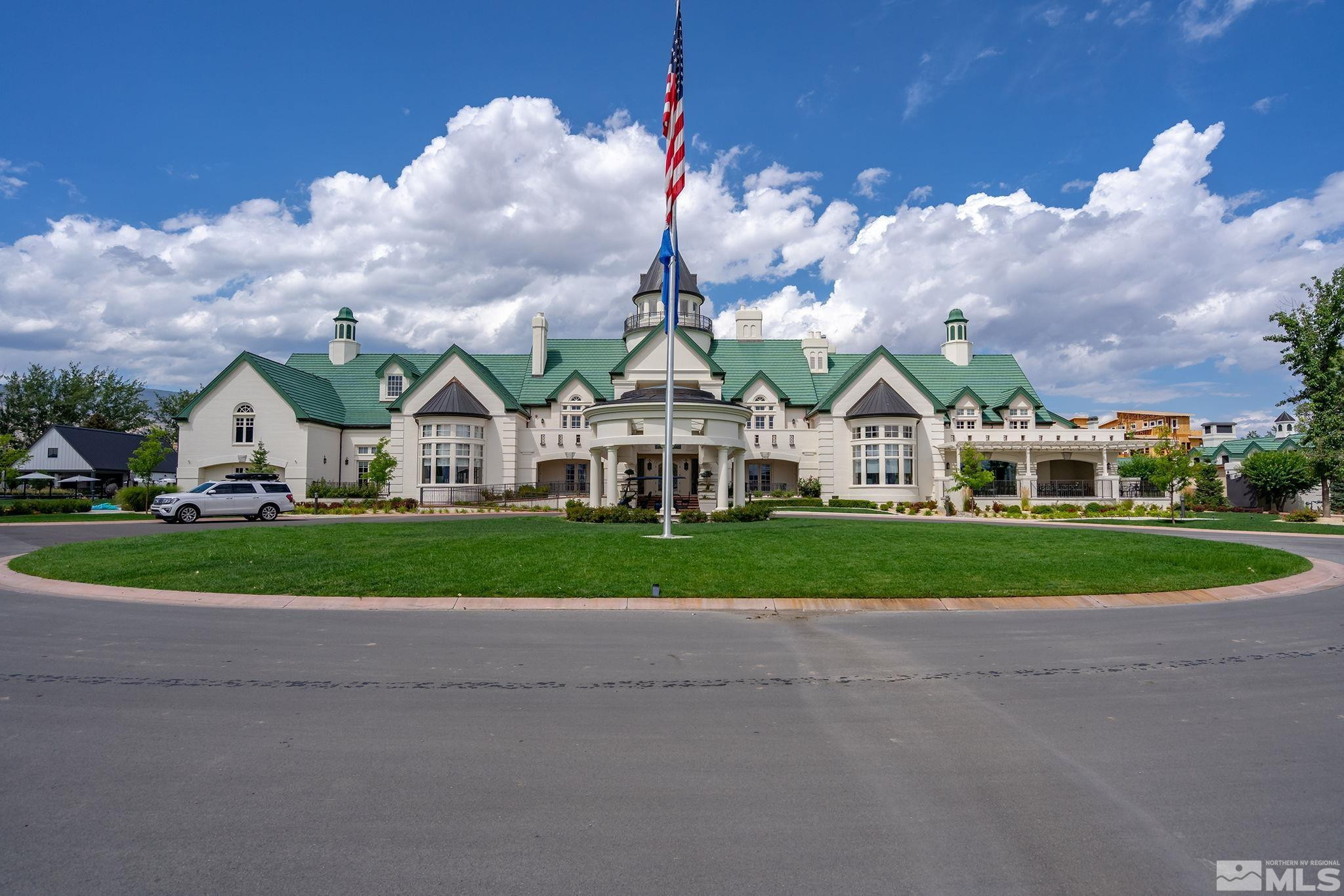 629 Silver Charm Way, Unit 7 Reno, NV 89511 - Photo 31 of 35 a view of multiple houses with a yard