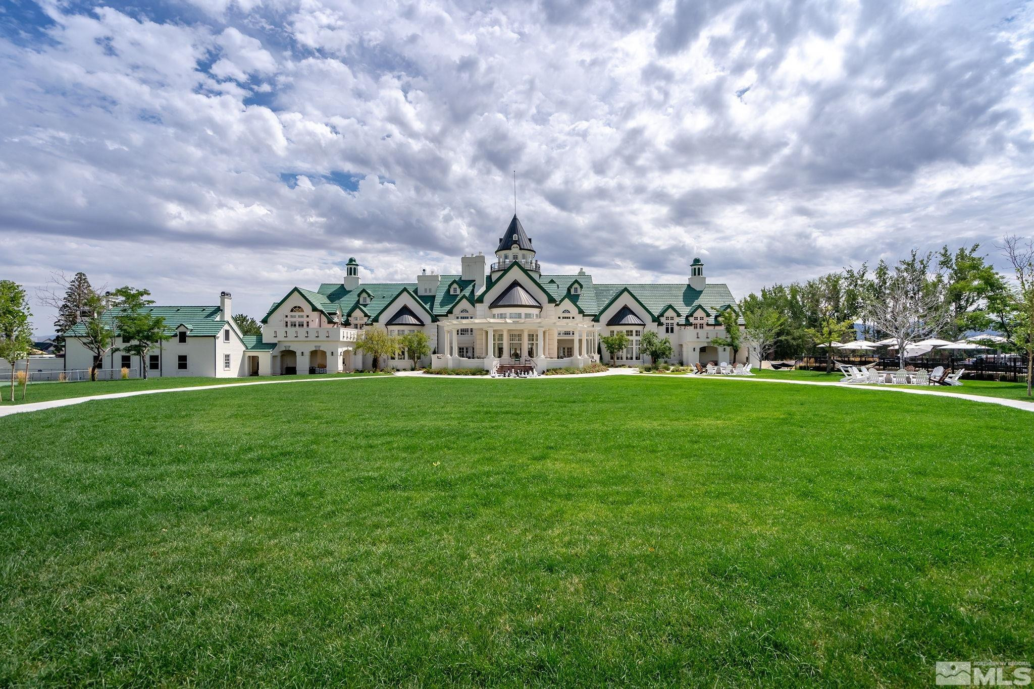629 Silver Charm Way, Unit 7 Reno, NV 89511 - Photo 33 of 35 a view of building with garden in front of statue