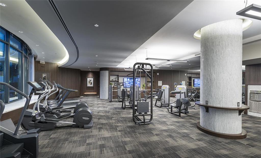 3150 Roswell Road Northwest, Unit 1410 Atlanta, GA 30305 - Photo 17 of 25 a view of a room with gym equipment