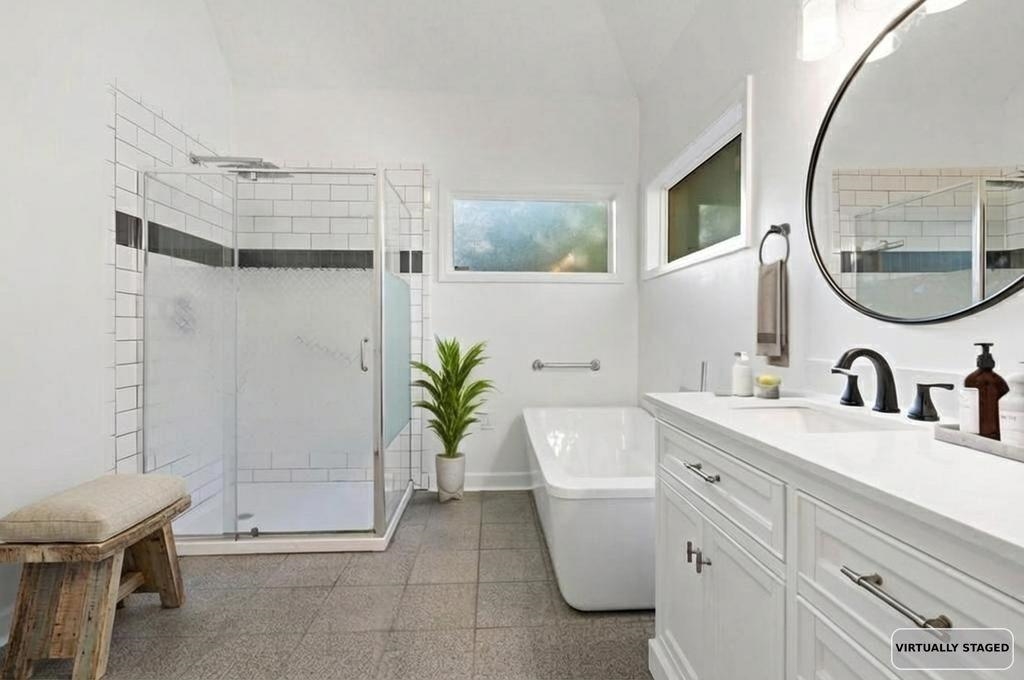 2389 Carrol Ridge Lane Cordova, TN 38016 - Photo 13 of 18 Full bathroom with vanity, a shower stall, and a freestanding bath