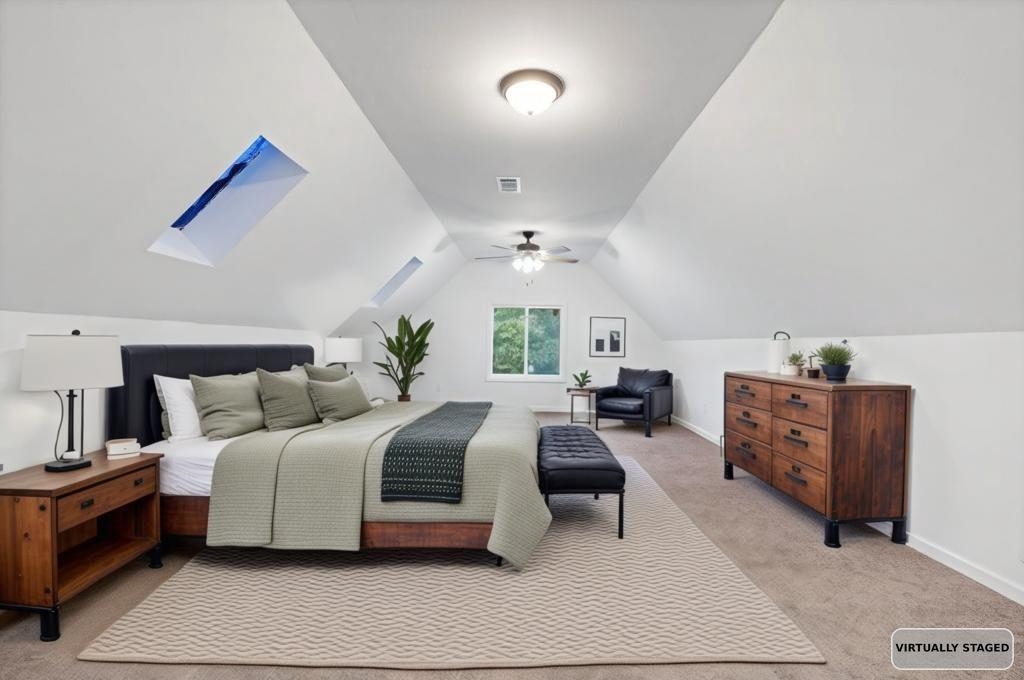 2389 Carrol Ridge Lane Cordova, TN 38016 - Photo 14 of 18 Bedroom featuring light colored carpet, vaulted ceiling, and ceiling fan