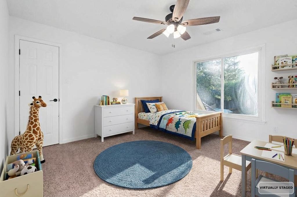 2389 Carrol Ridge Lane Cordova, TN 38016 - Photo 15 of 18 Bedroom with carpet floors and ceiling fan