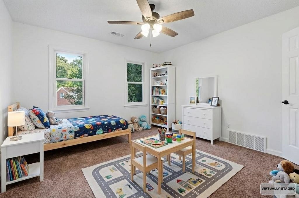 2389 Carrol Ridge Lane Cordova, TN 38016 - Photo 16 of 18 Bedroom featuring dark colored carpet and ceiling fan