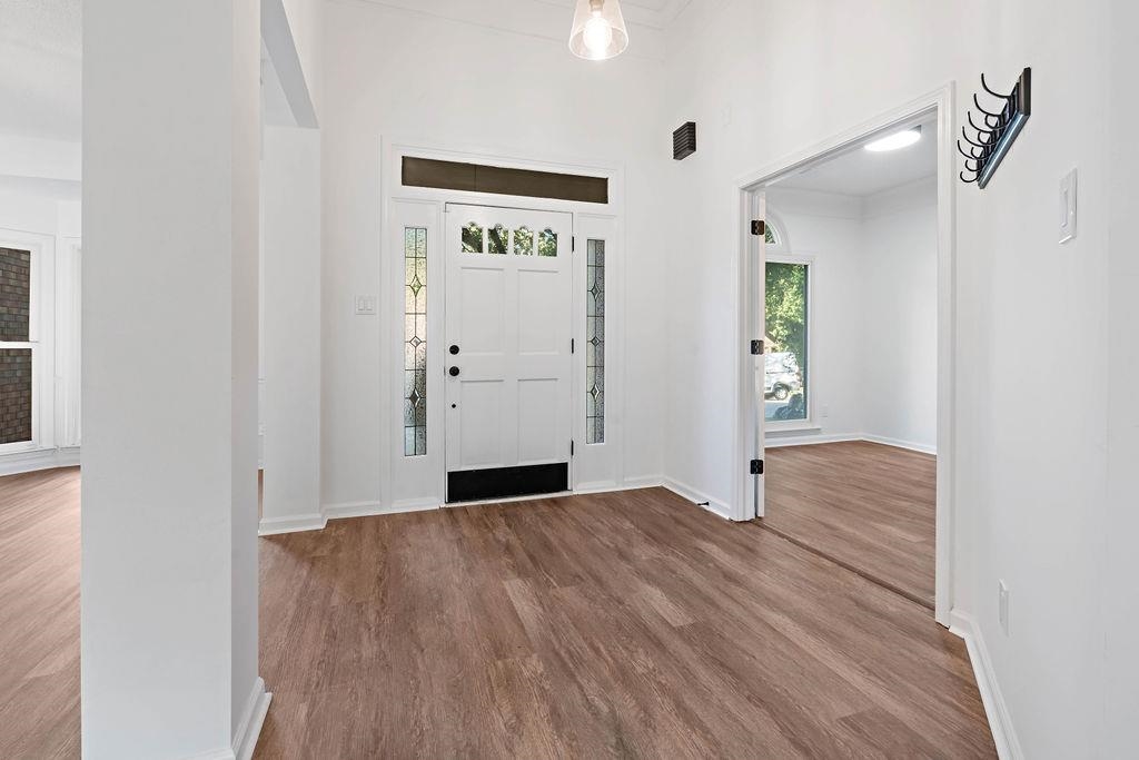 2389 Carrol Ridge Lane Cordova, TN 38016 - Photo 2 of 18 Entryway featuring dark wood finished floors and a towering ceiling