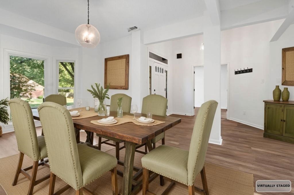 2389 Carrol Ridge Lane Cordova, TN 38016 - Photo 4 of 18 Dining space with wood finished floors and baseboards