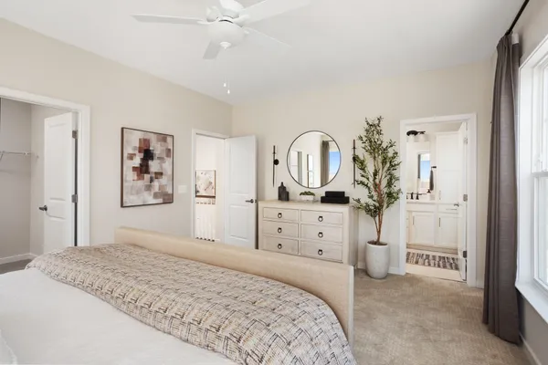 a bedroom with a large bed and closet