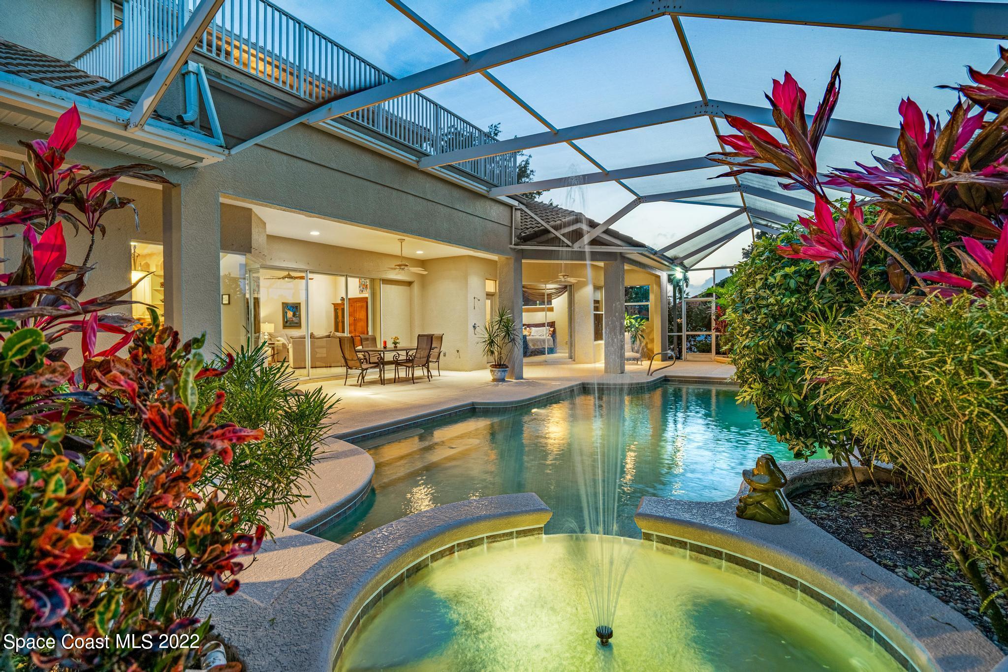 4251 Stoney Point Road Melbourne, FL 32940 - Photo 36 of 62 a view of a swimming pool with a patio