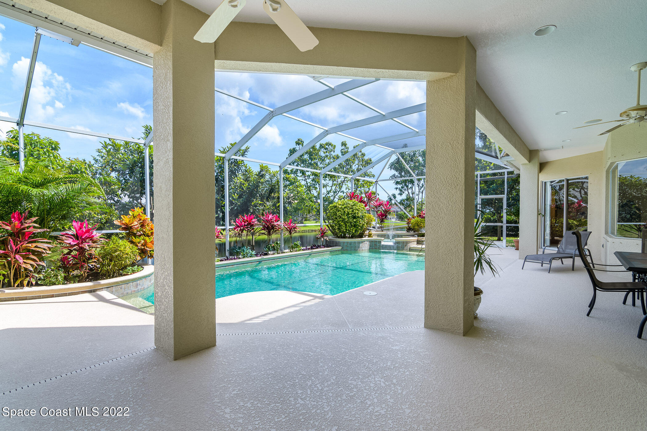4251 Stoney Point Road Melbourne, FL 32940 - Photo 41 of 62 a view of a porch with furniture and garden view
