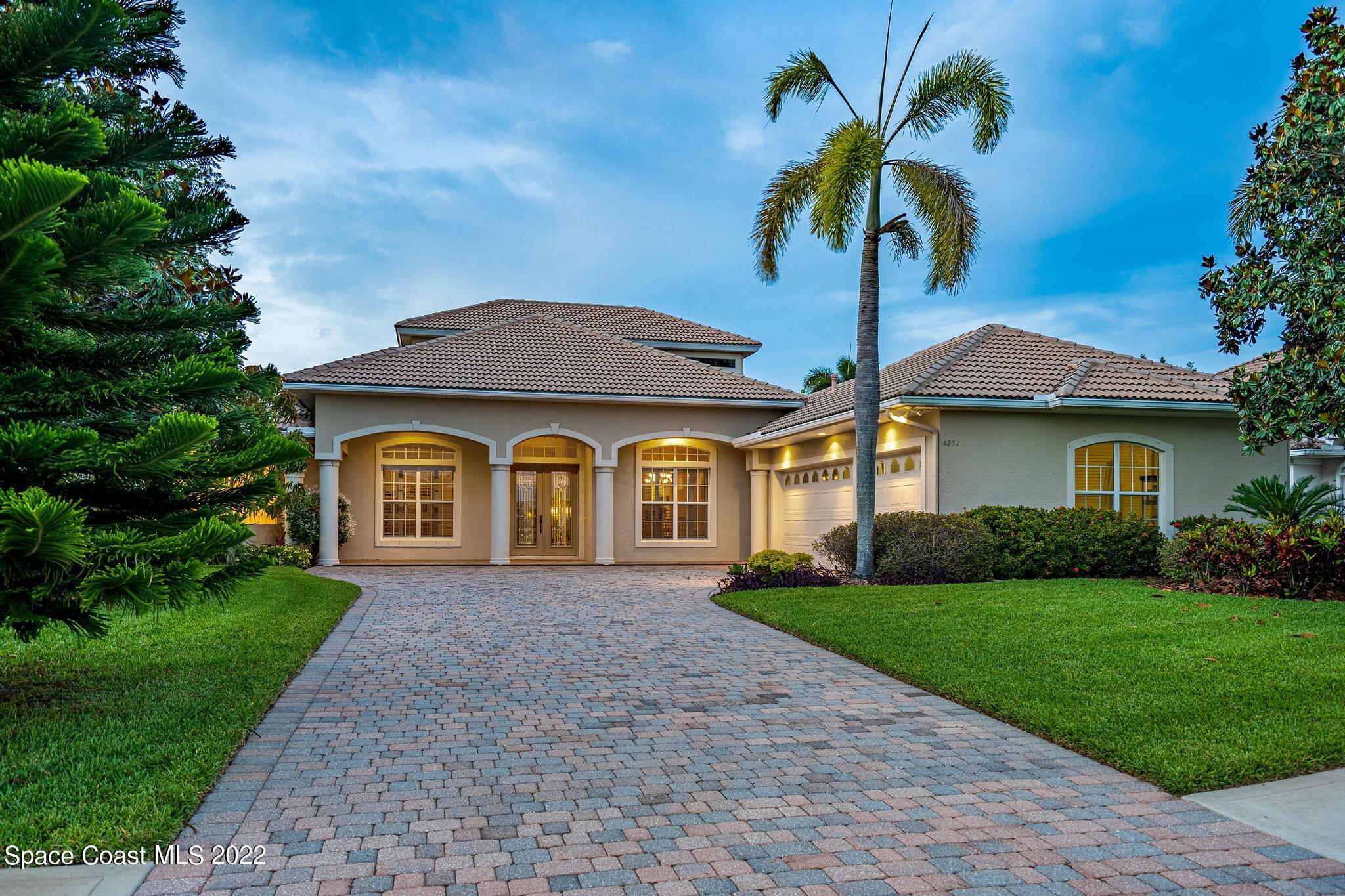 4251 Stoney Point Road Melbourne, FL 32940 - Photo 46 of 62 a front view of a house with garden