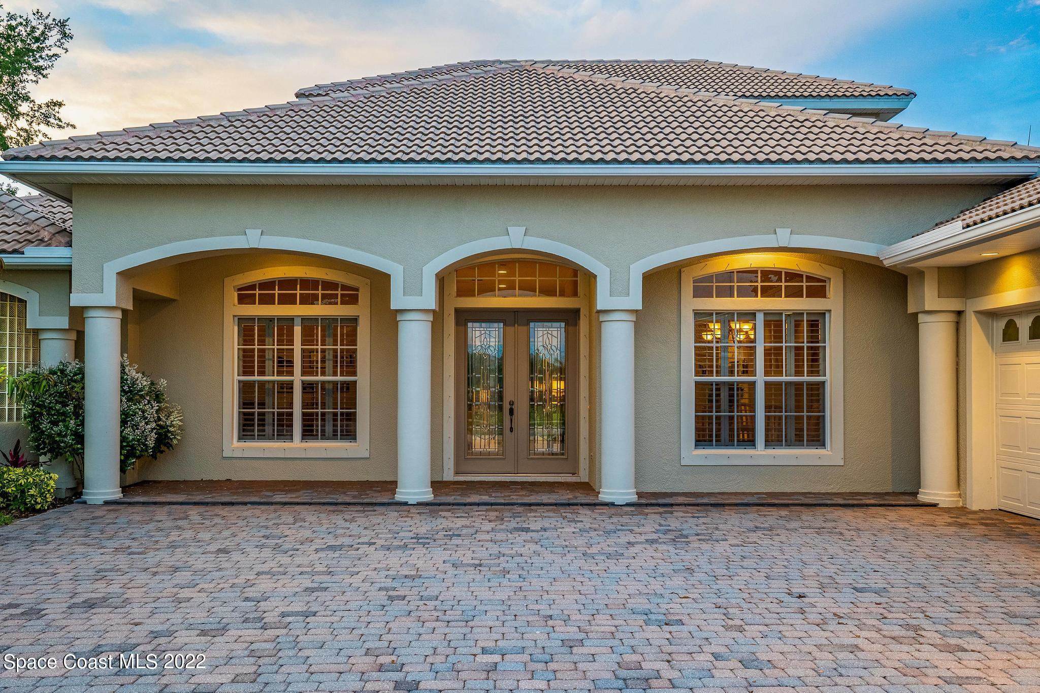 4251 Stoney Point Road Melbourne, FL 32940 - Photo 47 of 62 a front view of a house