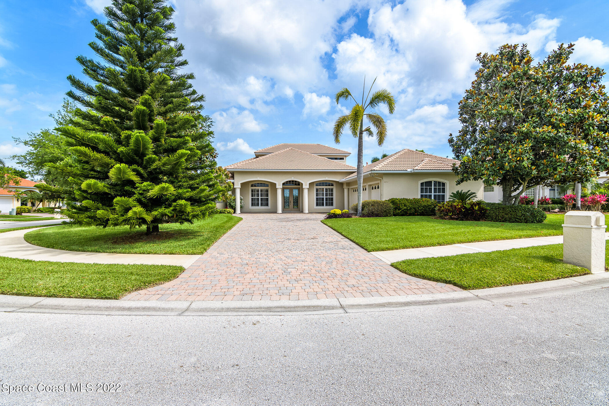 4251 Stoney Point Road Melbourne, FL 32940 - Photo 55 of 62 a front view of house with yard and green space