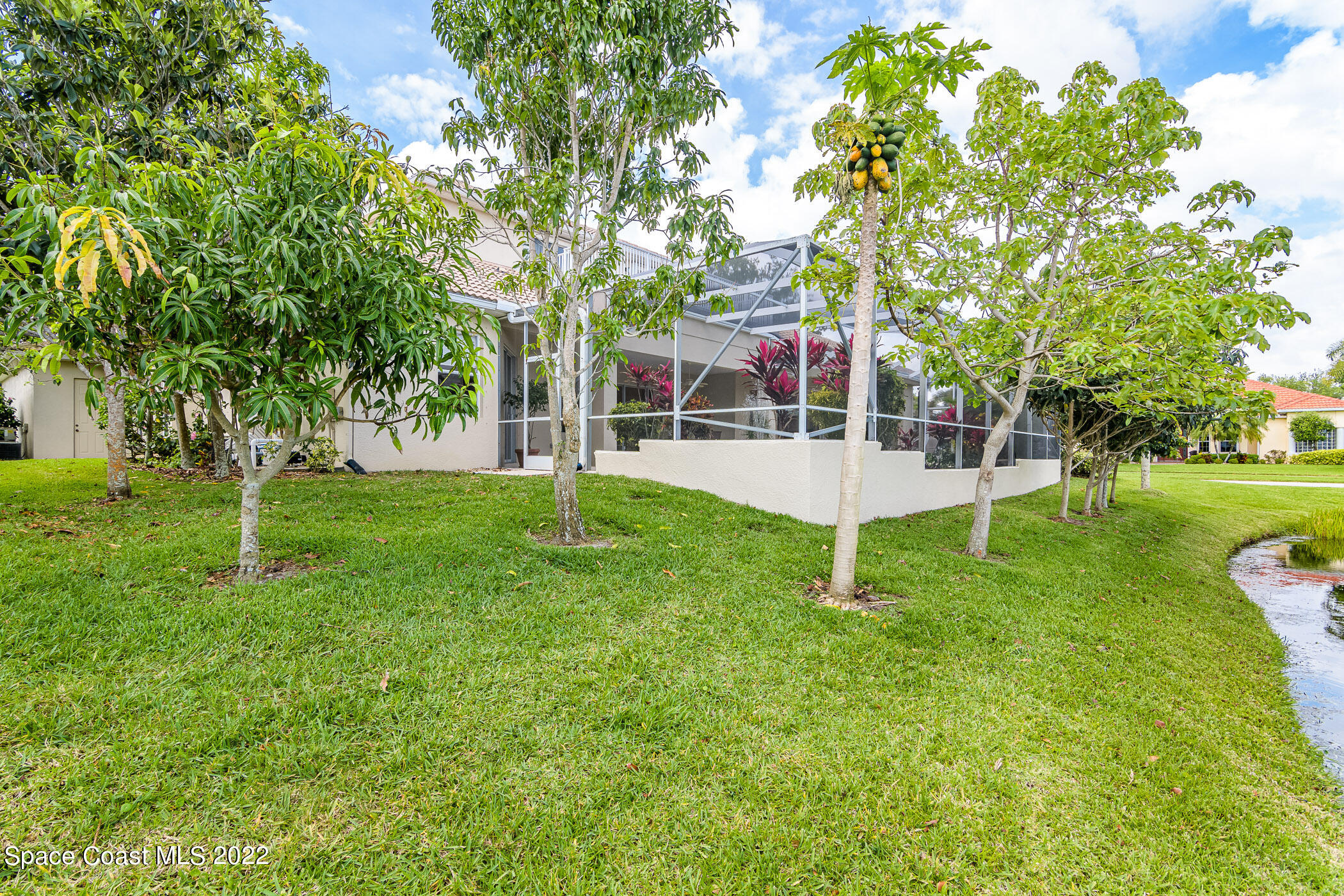 4251 Stoney Point Road Melbourne, FL 32940 - Photo 60 of 62 a garden view