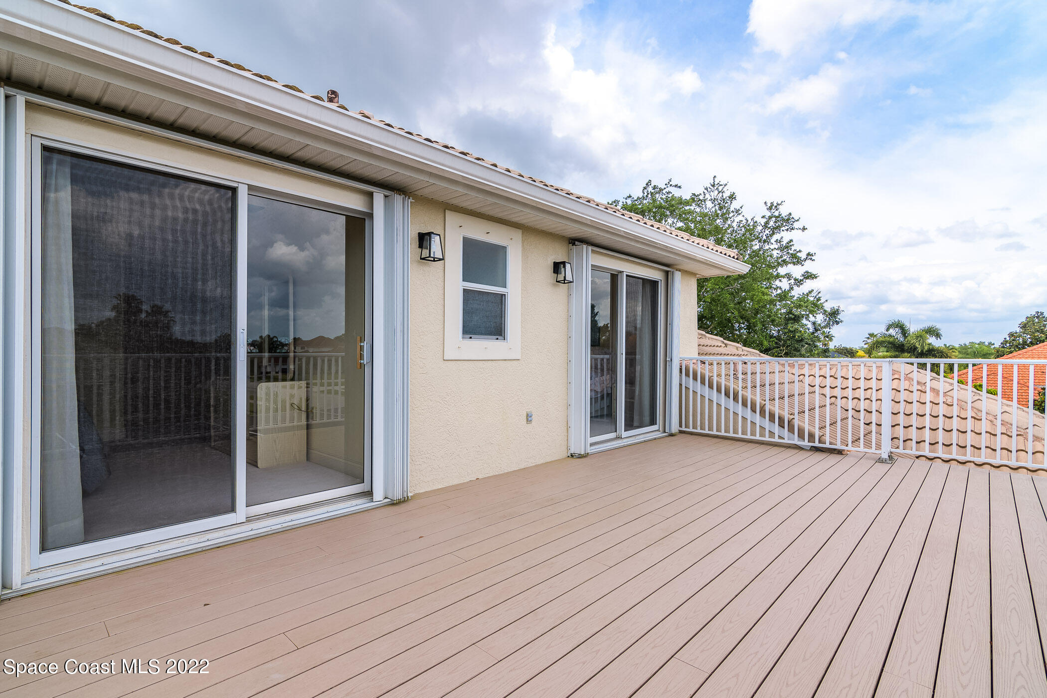 4251 Stoney Point Road Melbourne, FL 32940 - Photo 61 of 62 a view of a house with a deck