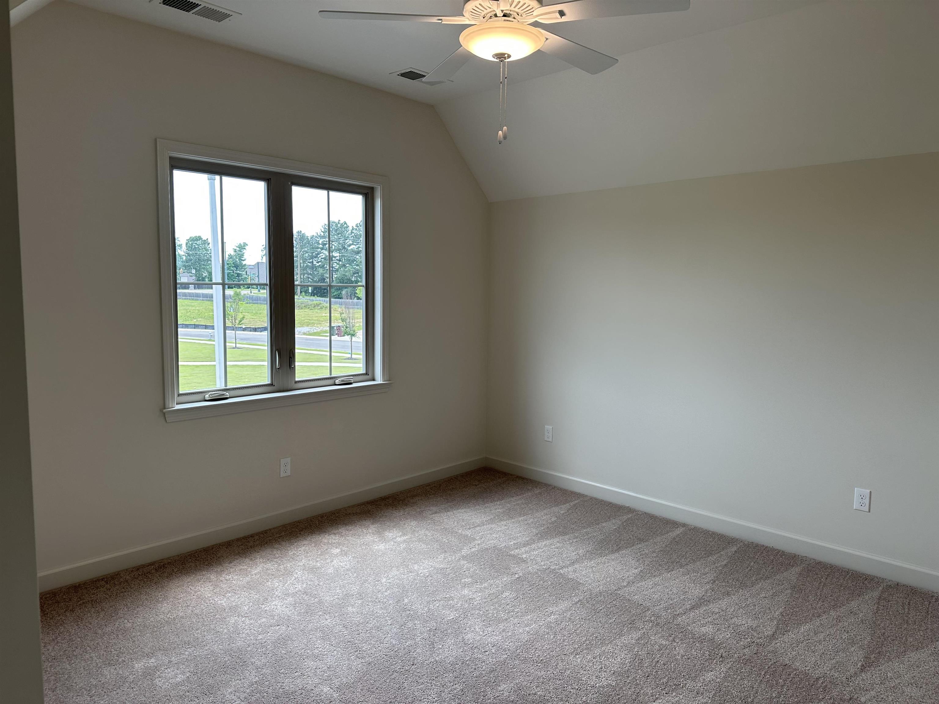 11504 Sunsparkler Way Collierville, TN 38017 - Photo 11 of 13 an empty room with a window