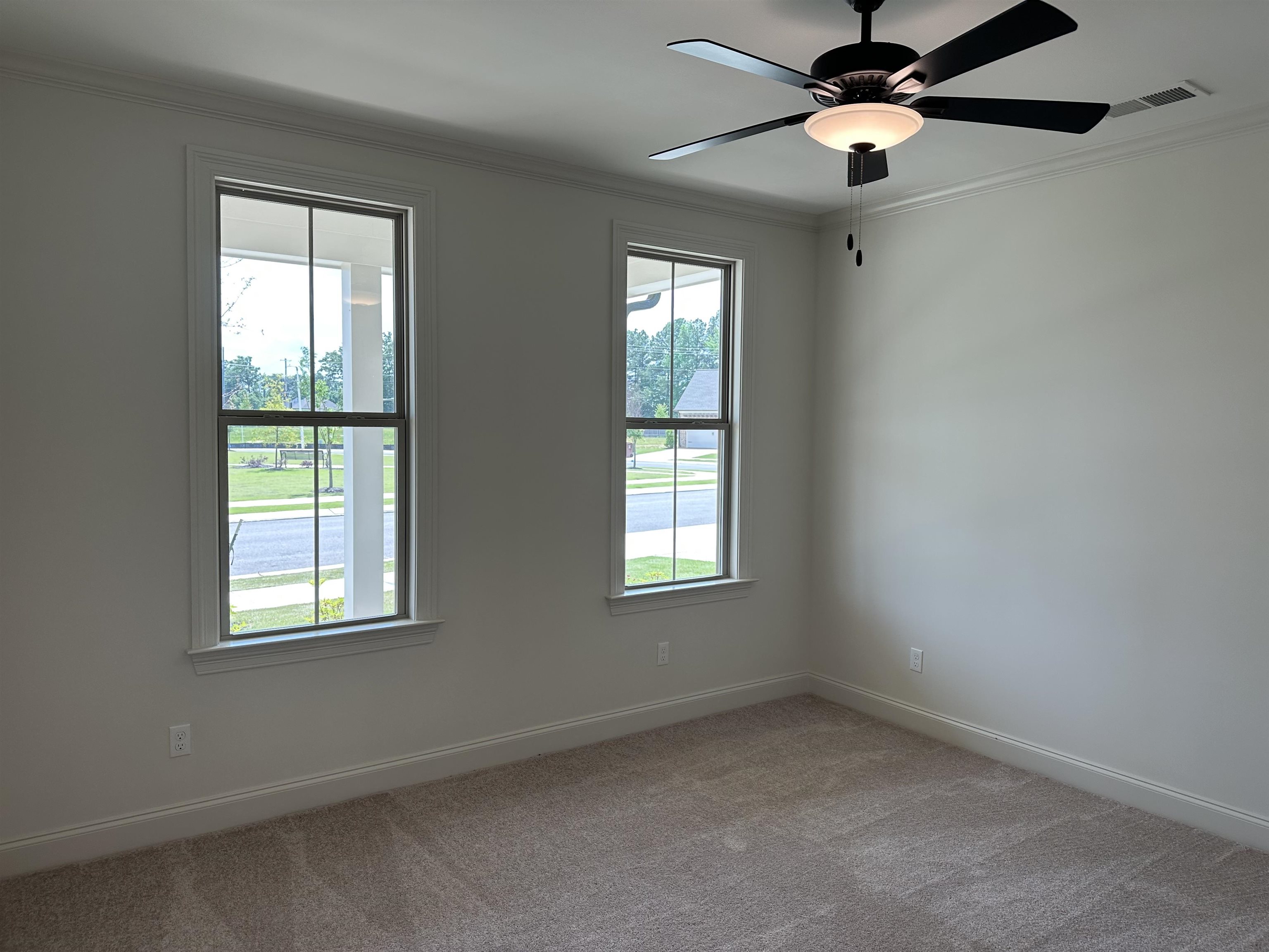 11504 Sunsparkler Way Collierville, TN 38017 - Photo 5 of 13 an empty room with windows and fan