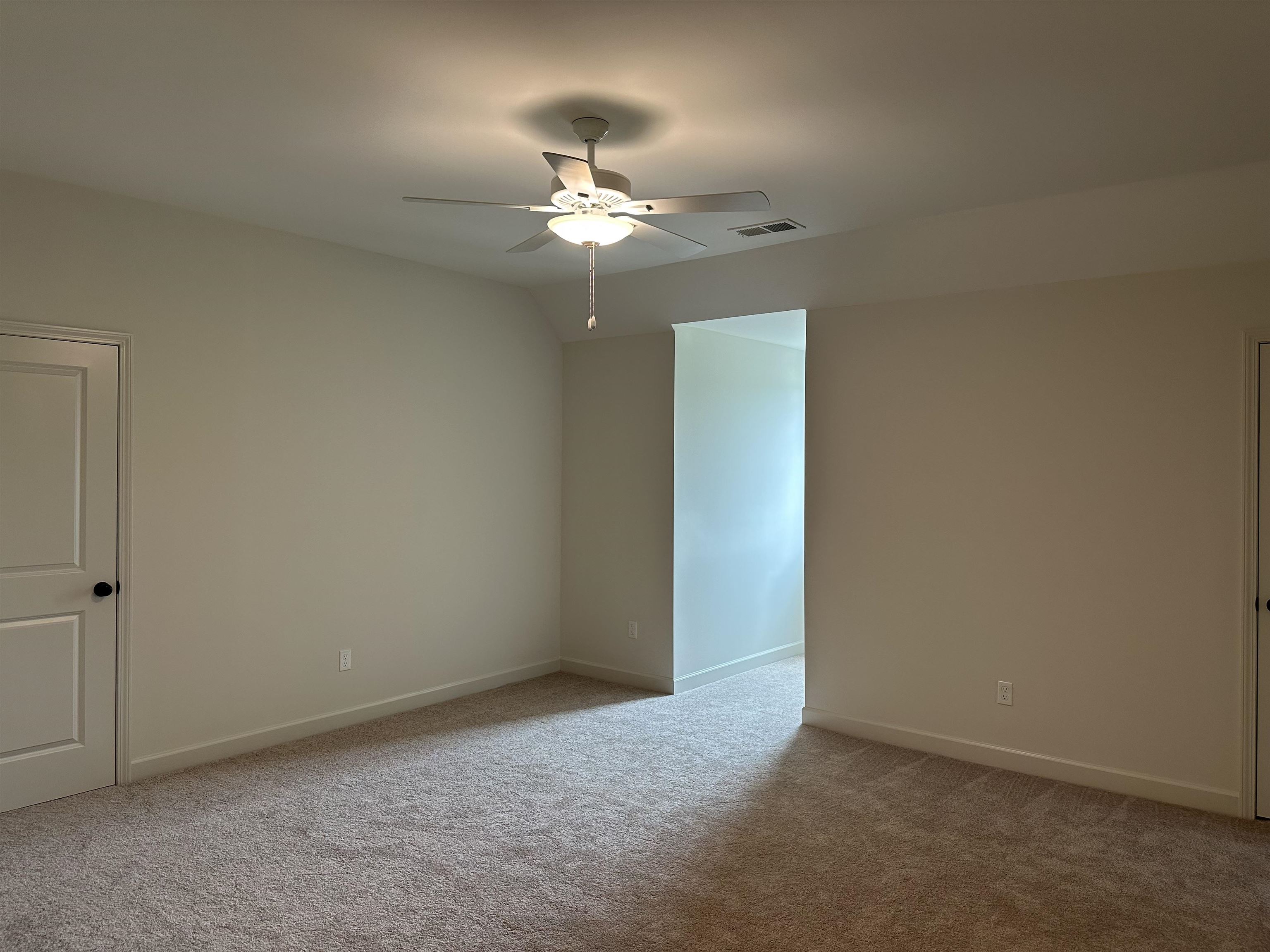 11504 Sunsparkler Way Collierville, TN 38017 - Photo 8 of 13 an empty room with a chandelier fan