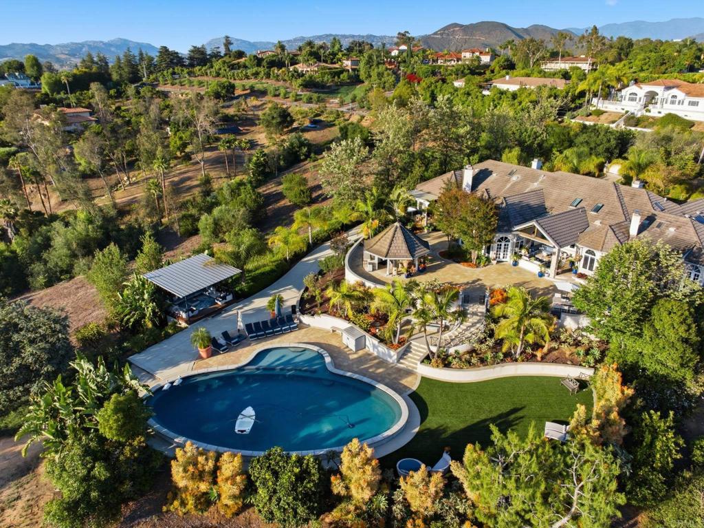 4248 Citrus Drive Fallbrook, CA 92028 - Photo 1 of 71 an aerial view of a house with a yard and green space