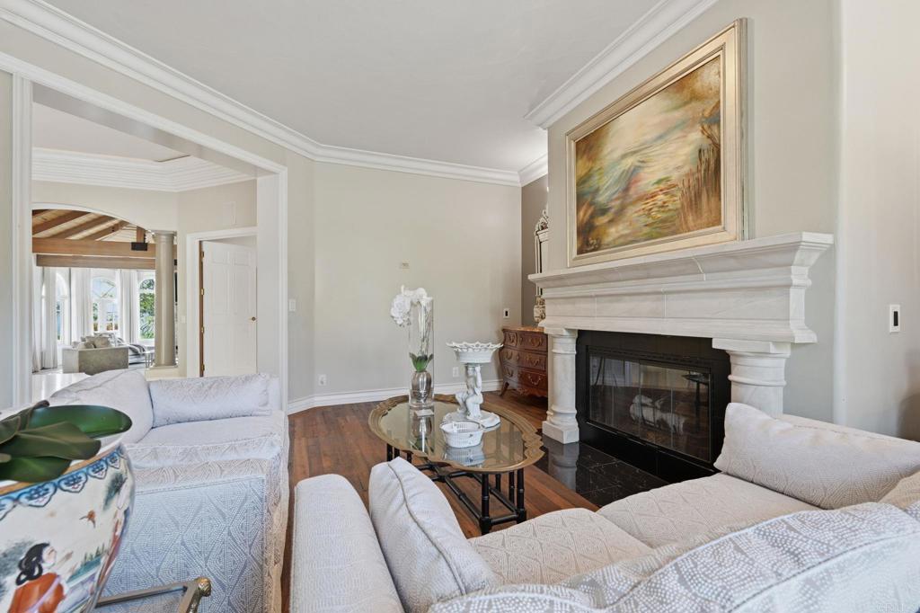 4248 Citrus Drive Fallbrook, CA 92028 - Photo 19 of 71 a living room with furniture a fireplace and a large window
