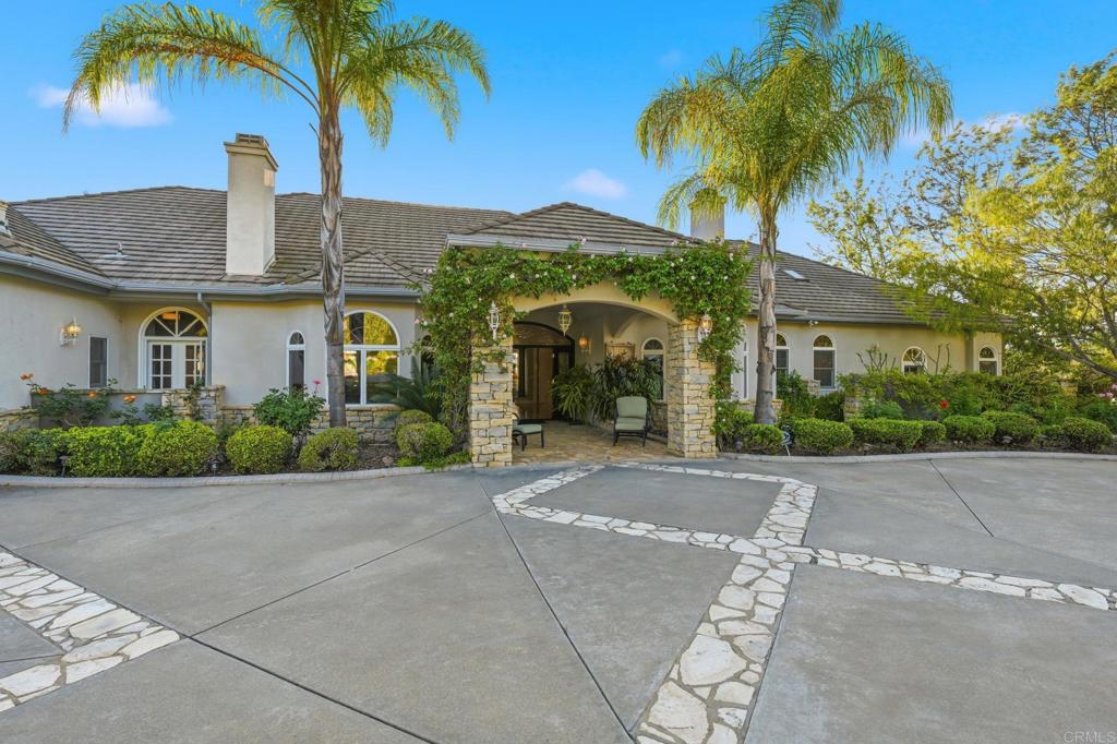 4248 Citrus Drive Fallbrook, CA 92028 - Photo 2 of 71 a view of a house with palm trees