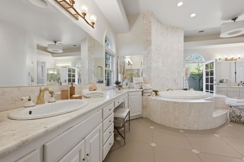 4248 Citrus Drive Fallbrook, CA 92028 - Photo 31 of 71 a bathroom with a tub sink and mirror