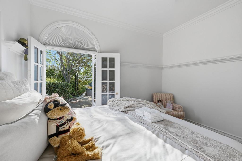 4248 Citrus Drive Fallbrook, CA 92028 - Photo 41 of 71 a bed sitting in a bedroom next to a window