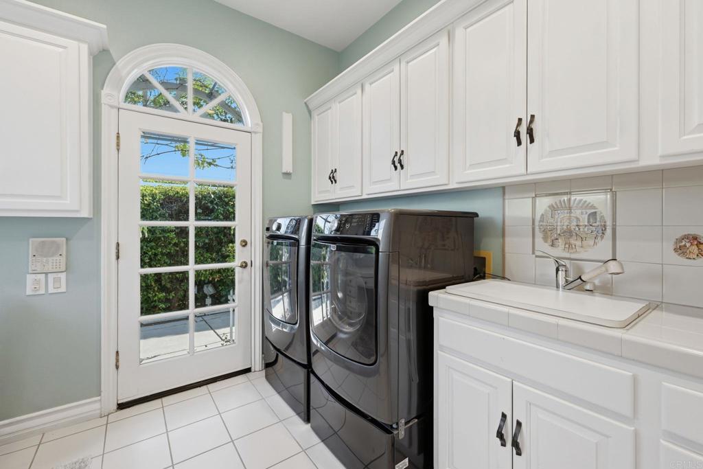 4248 Citrus Drive Fallbrook, CA 92028 - Photo 46 of 71 a bathroom with a sink a window and a mirror