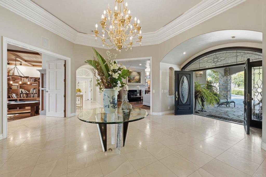 4248 Citrus Drive Fallbrook, CA 92028 - Photo 6 of 71 a view of a hallway with chandelier
