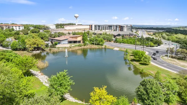 a view of a lake with a city