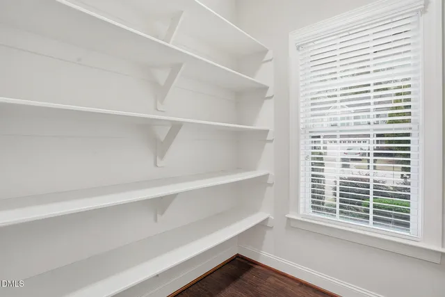 a view of a room with a window